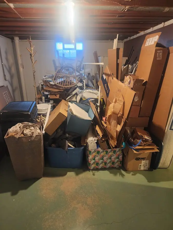 Roll-off dumpster container at job site for 15 Yard Dumpster Rental in Wahneta